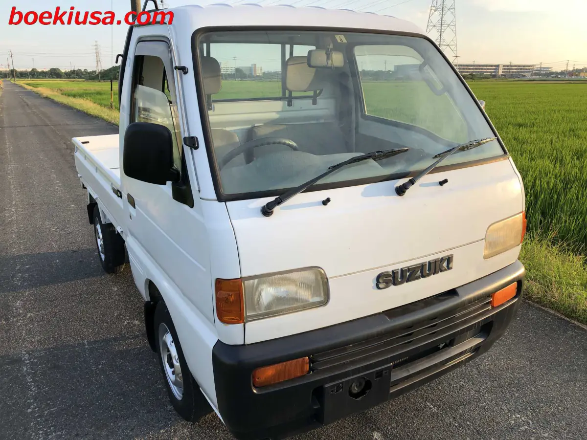 1998 Suzuki Carry 4x4, a white Kei Truck, for sale at Boeki USA in Paterson, NJ (photo 1 of 20)