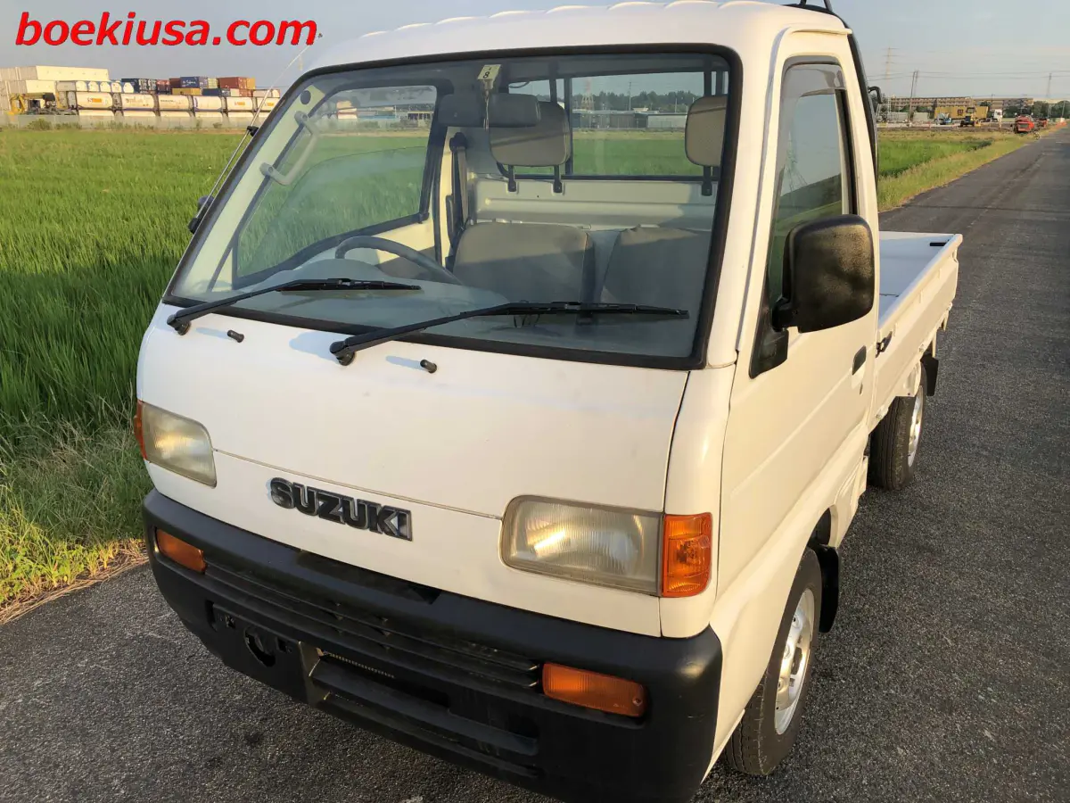 1998 Suzuki Carry 4x4, a white Kei Truck, for sale at Boeki USA in Paterson, NJ (photo 2 of 20)
