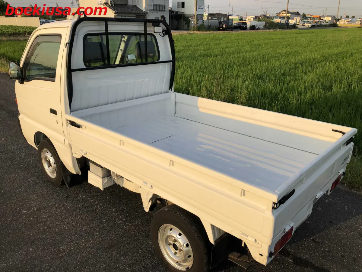 1998 Suzuki Carry 4x4, a white Kei Truck, for sale at Boeki USA in Paterson, NJ (photo 3 of 20)