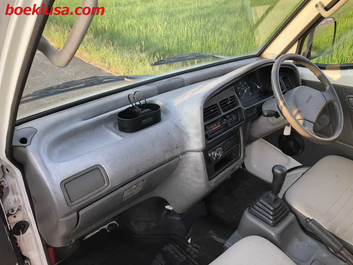 1998 Suzuki Carry 4x4, a white Kei Truck, for sale at Boeki USA in Paterson, NJ (photo 9 of 20)