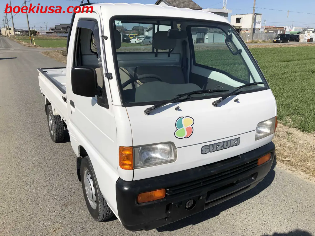 1998 Suzuki Carry 4x4, a white Kei Truck, for sale at Boeki USA in Paterson, NJ (photo 1 of 20)