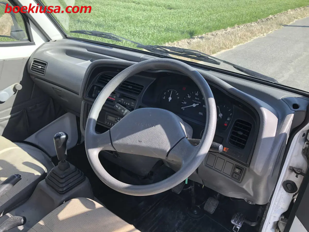 1998 Suzuki Carry 4x4, a white Kei Truck, for sale at Boeki USA in Paterson, NJ (photo 13 of 20)