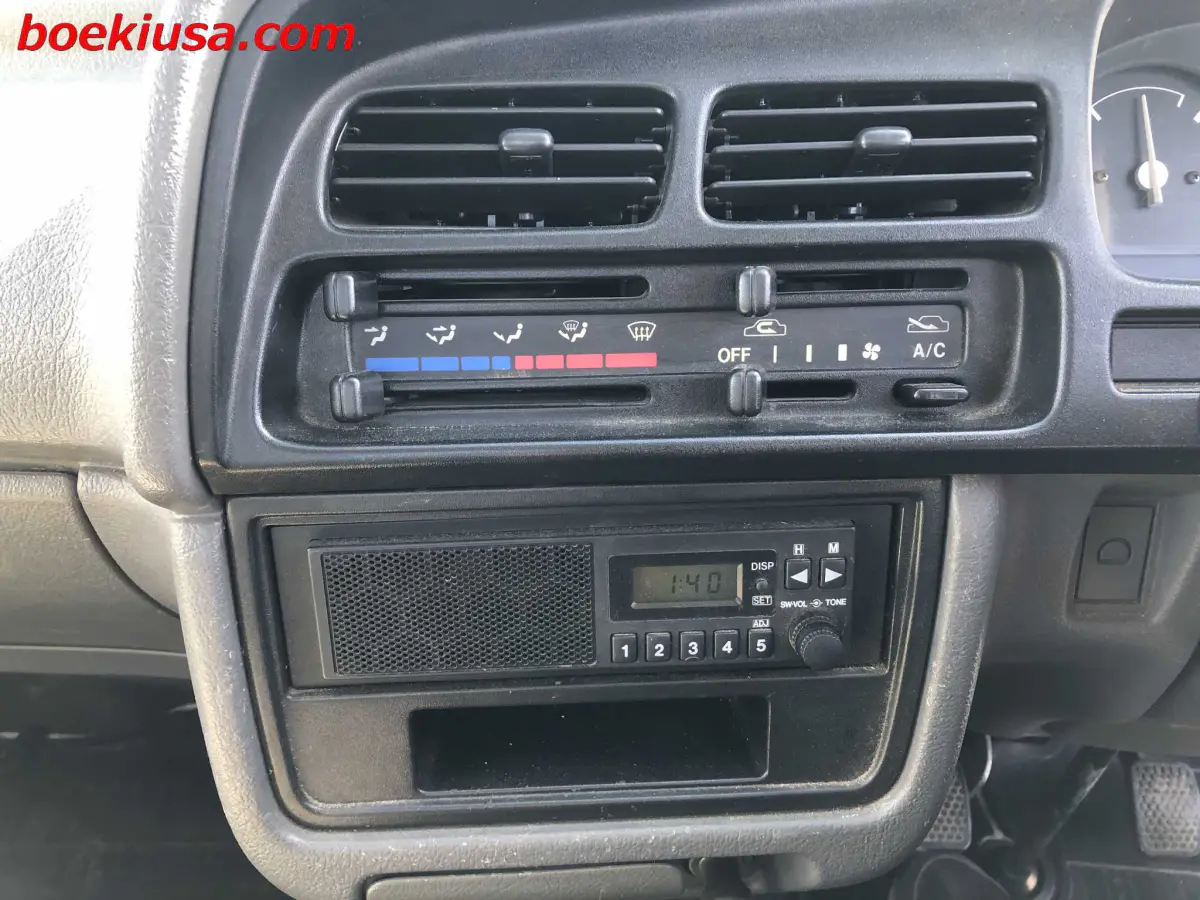 1998 Suzuki Carry 4x4, a white Kei Truck, for sale at Boeki USA in Paterson, NJ (photo 17 of 20)