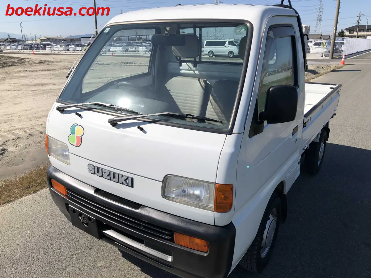 1998 Suzuki Carry 4x4, a white Kei Truck, for sale at Boeki USA in Paterson, NJ (photo 2 of 20)