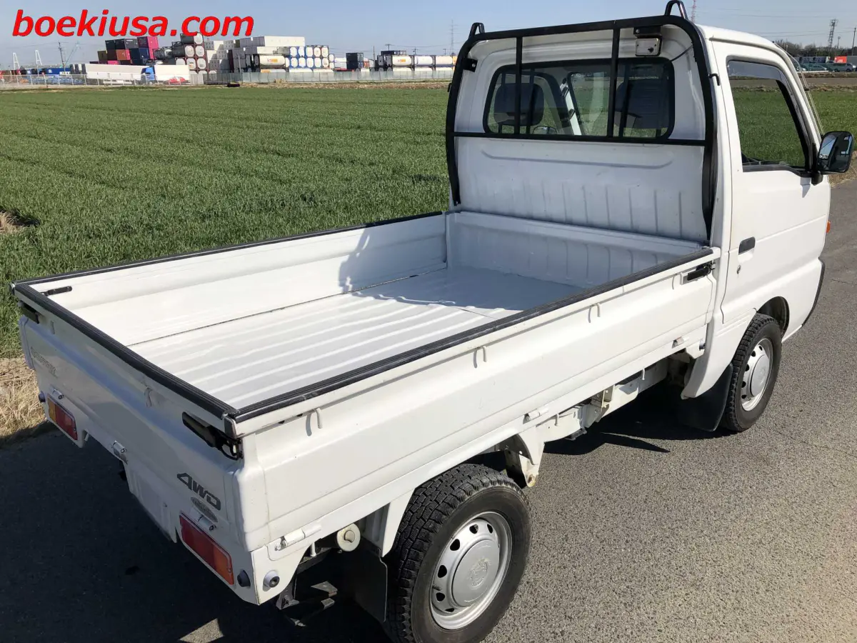 1998 Suzuki Carry 4x4, a white Kei Truck, for sale at Boeki USA in Paterson, NJ (photo 4 of 20)