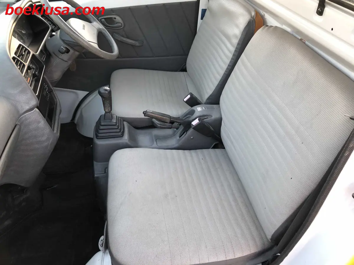 1998 Suzuki Carry 4x4, a yellow ii Kei Truck, for sale at Boeki USA in Paterson, NJ (photo 10 of 20)