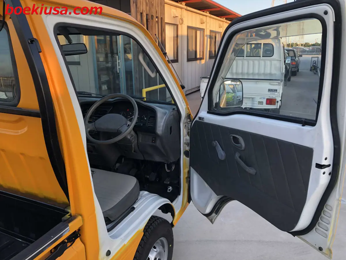 1998 Suzuki Carry 4x4, a yellow ii Kei Truck, for sale at Boeki USA in Paterson, NJ (photo 12 of 20)