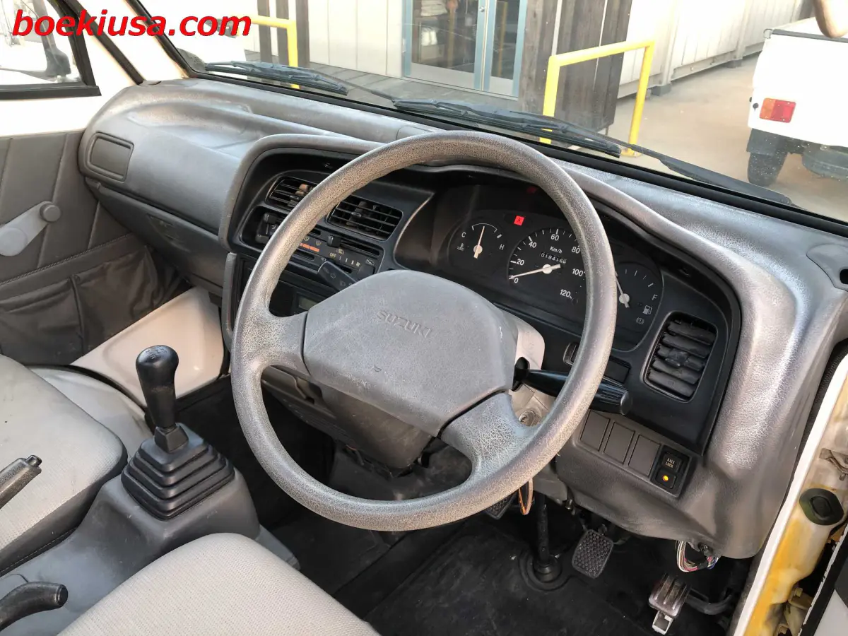 1998 Suzuki Carry 4x4, a yellow ii Kei Truck, for sale at Boeki USA in Paterson, NJ (photo 13 of 20)