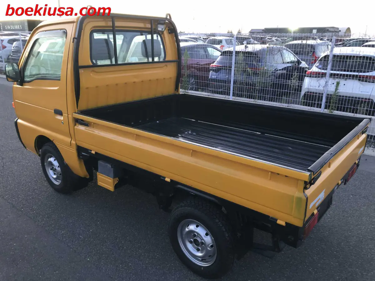 1998 Suzuki Carry 4x4, a yellow ii Kei Truck, for sale at Boeki USA in Paterson, NJ (photo 3 of 20)