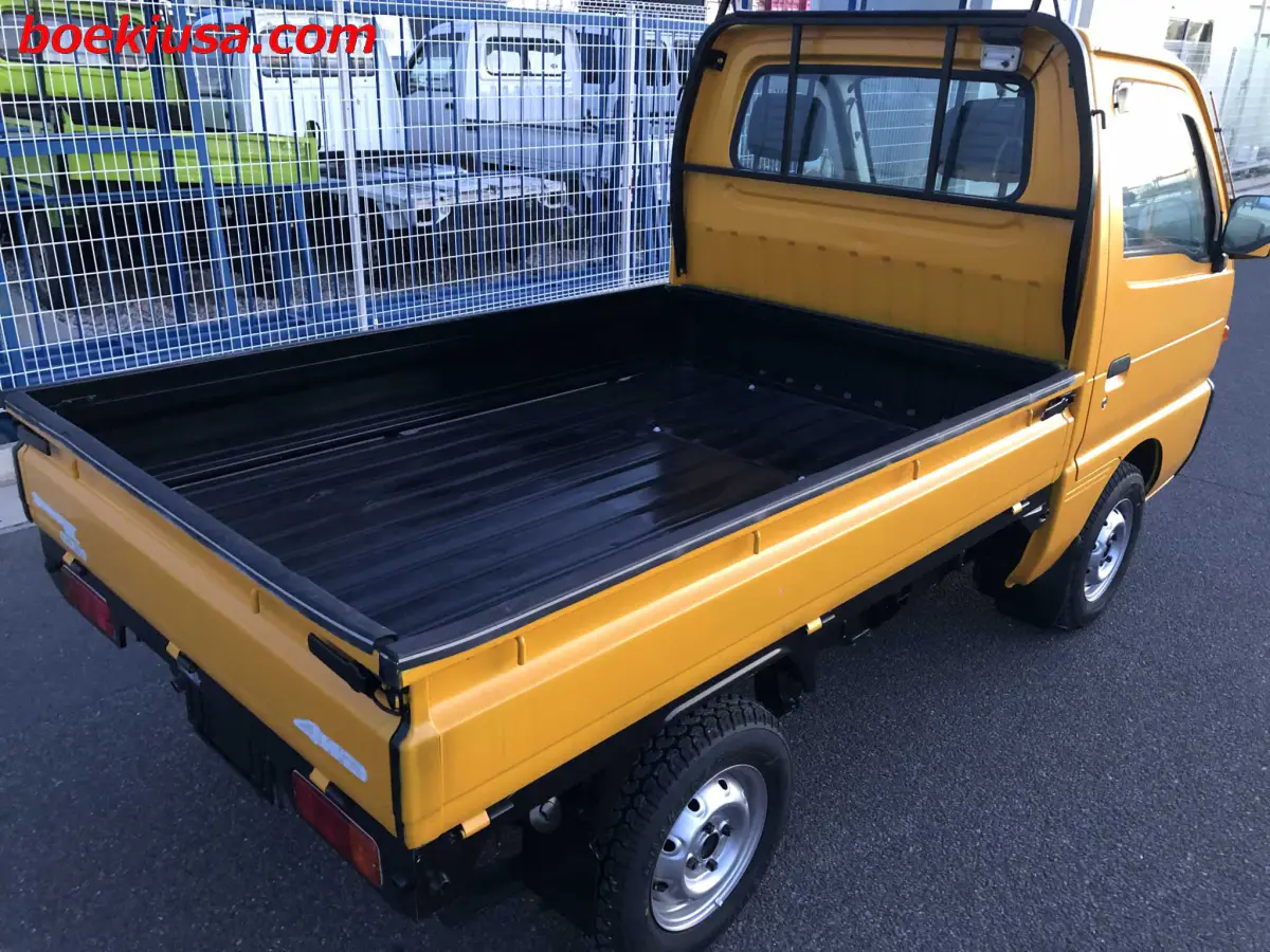 1998 Suzuki Carry 4x4, a yellow ii Kei Truck, for sale at Boeki USA in Paterson, NJ (photo 4 of 20)