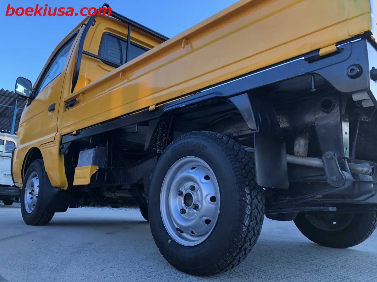 1998 Suzuki Carry 4x4, a yellow ii Kei Truck, for sale at Boeki USA in Paterson, NJ (photo 5 of 20)