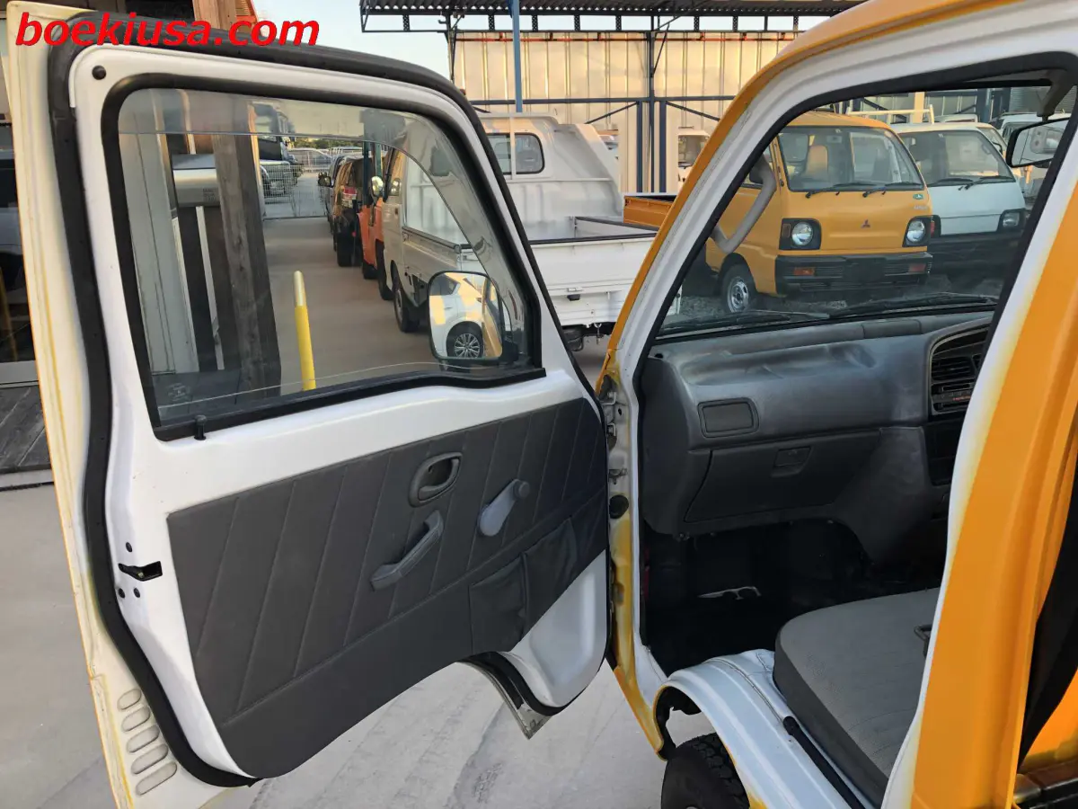 1998 Suzuki Carry 4x4, a yellow ii Kei Truck, for sale at Boeki USA in Paterson, NJ (photo 8 of 20)