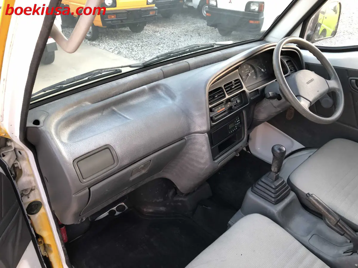 1998 Suzuki Carry 4x4, a yellow ii Kei Truck, for sale at Boeki USA in Paterson, NJ (photo 9 of 20)