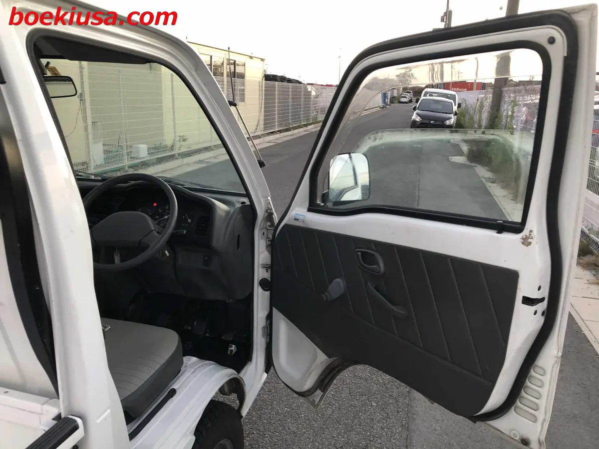 1998 Suzuki Carry 4x4, a white Kei Truck, for sale at Boeki USA in Paterson, NJ (photo 12 of 20)