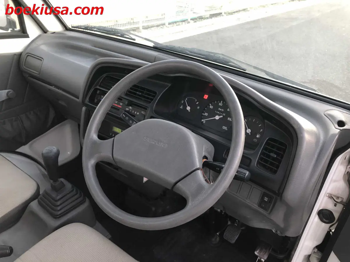 1998 Suzuki Carry 4x4, a white Kei Truck, for sale at Boeki USA in Paterson, NJ (photo 13 of 20)