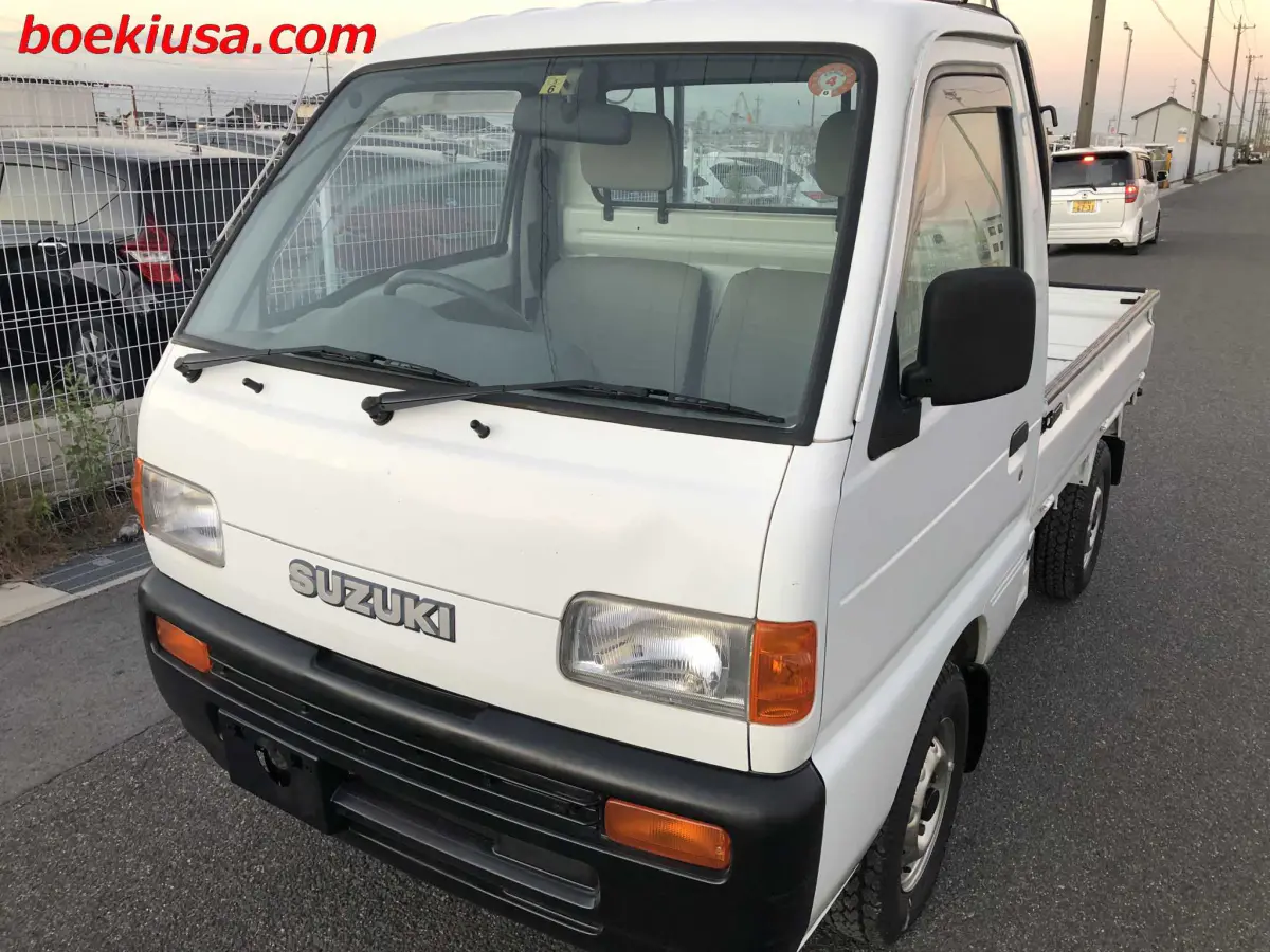 1998 Suzuki Carry 4x4, a white Kei Truck, for sale at Boeki USA in Paterson, NJ (photo 2 of 20)