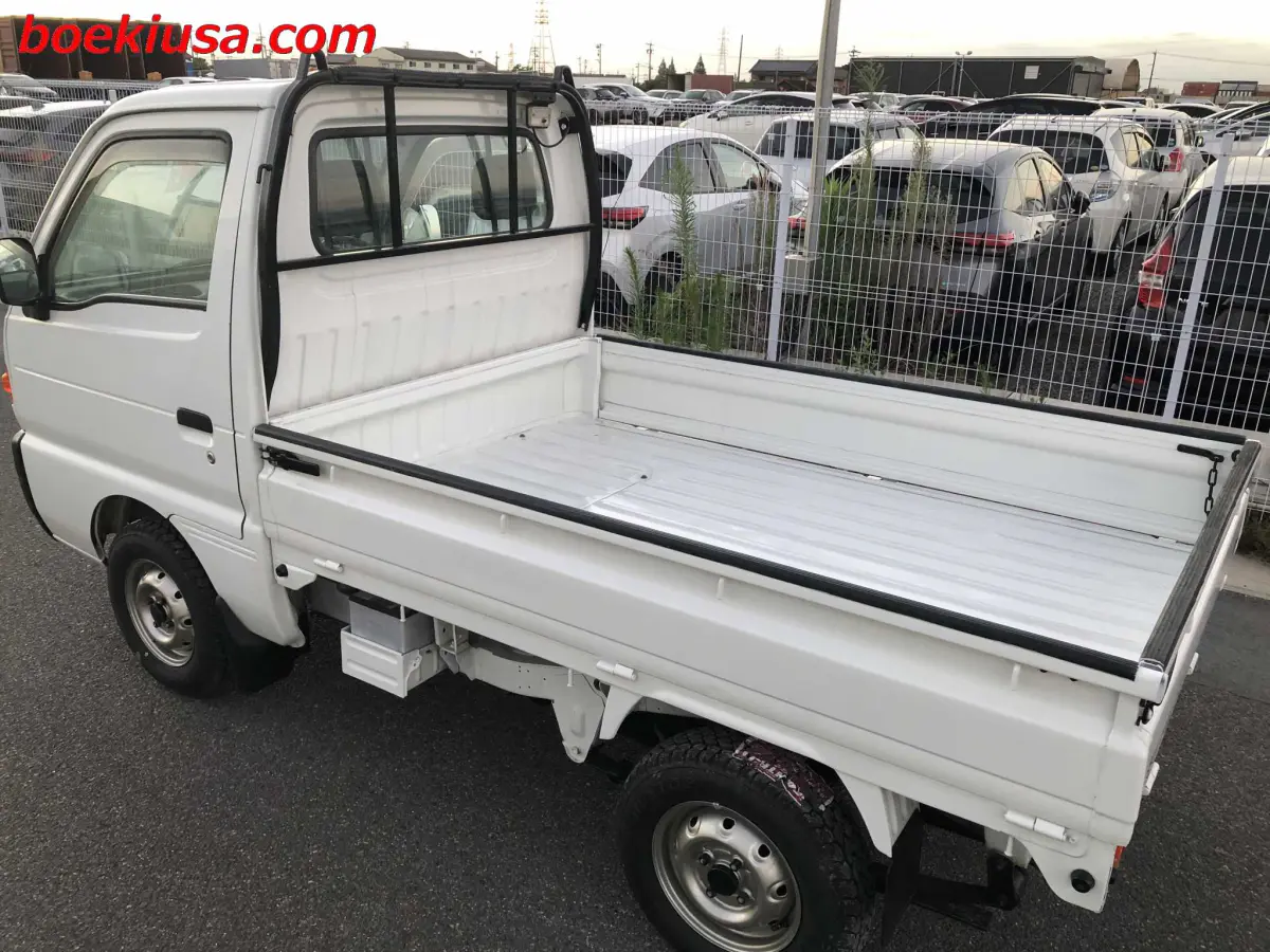 1998 Suzuki Carry 4x4, a white Kei Truck, for sale at Boeki USA in Paterson, NJ (photo 3 of 20)