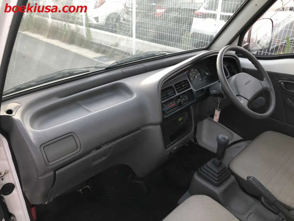 1998 Suzuki Carry 4x4, a white Kei Truck, for sale at Boeki USA in Paterson, NJ (photo 9 of 20)