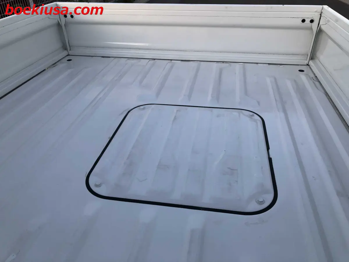1999 Honda Acty 4x4, a white Kei Truck, for sale at Boeki USA in Paterson, NJ (photo 7 of 20)