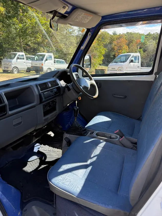 1999 Mitsubishi Minicab 4WD, a white Kei Truck, for sale at Mayberry Mini Trucks in Mount Airy, NC (photo 10 of 20)