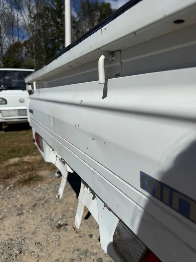 1999 Mitsubishi Minicab 4WD, a white Kei Truck, for sale at Mayberry Mini Trucks in Mount Airy, NC (photo 19 of 20)