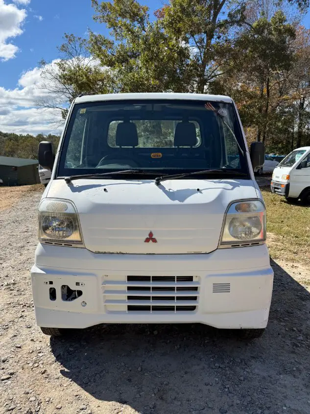 1999 Mitsubishi Minicab 4WD, a white Kei Truck, for sale at Mayberry Mini Trucks in Mount Airy, NC (photo 2 of 20)