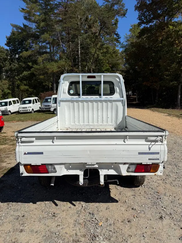1999 Mitsubishi Minicab 4WD, a white Kei Truck, for sale at Mayberry Mini Trucks in Mount Airy, NC (photo 6 of 20)