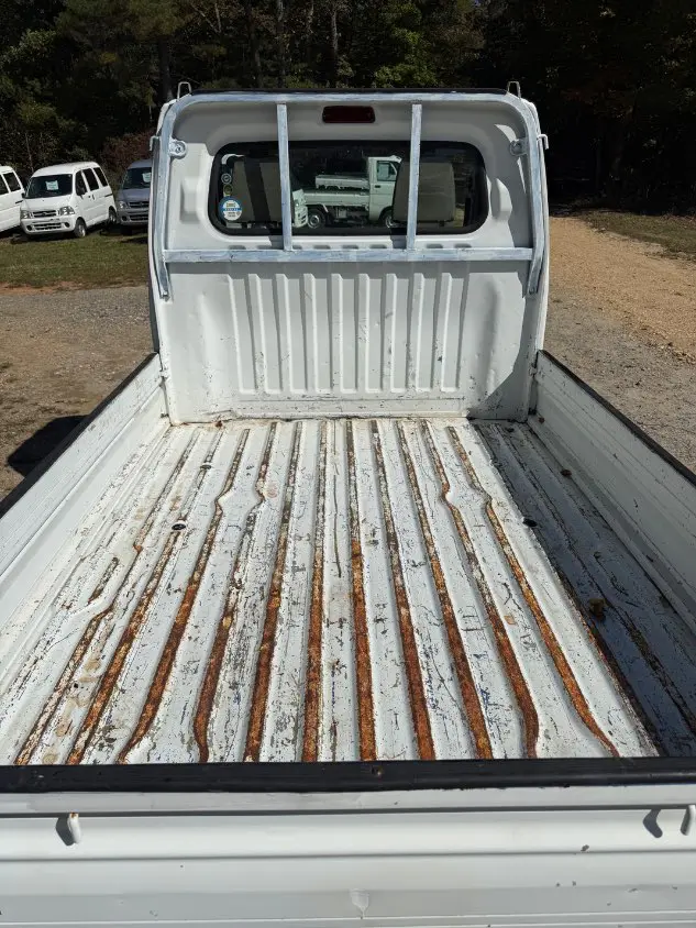 1999 Mitsubishi Minicab 4WD, a white Kei Truck, for sale at Mayberry Mini Trucks in Mount Airy, NC (photo 7 of 20)