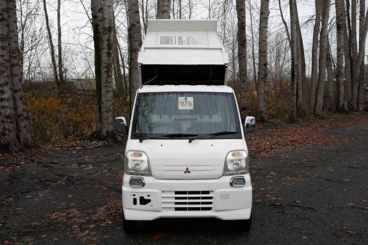 1999 Mitsubishi Minicab HD Dump, a black Kei Truck, for sale at The Import Guys in Ferndale, WA (photo 2 of 11)
