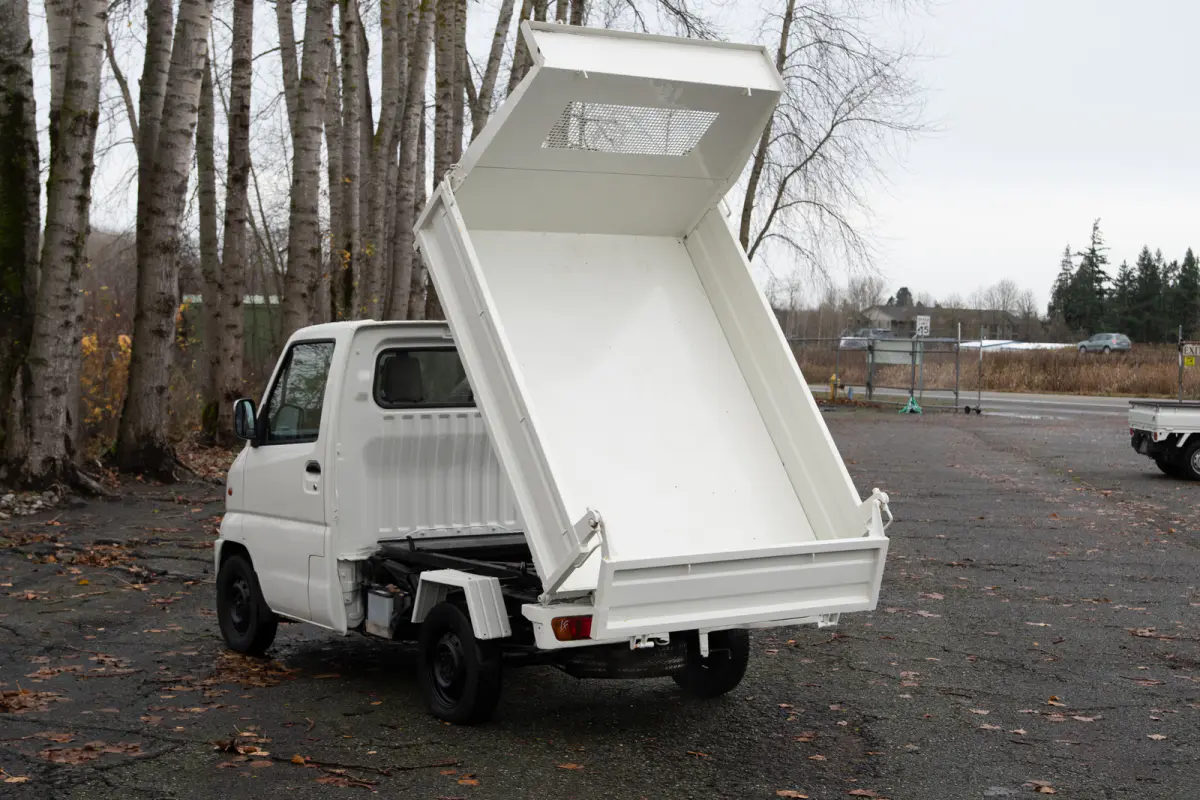 1999 Mitsubishi Minicab HD Dump, a black Kei Truck, for sale at The Import Guys in Ferndale, WA (photo 4 of 11)