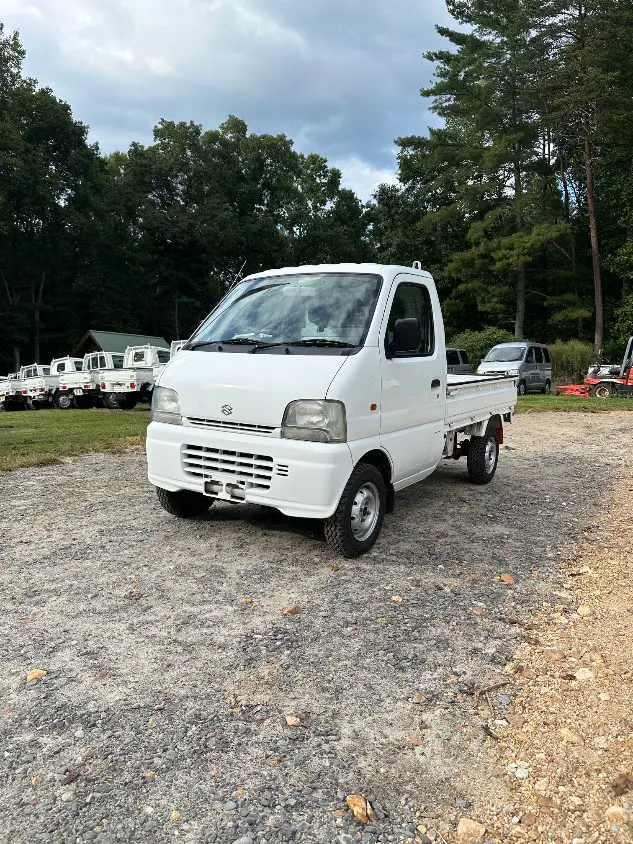 1999 Suzuki Carry 4WD, a white Kei Truck, for sale at Mayberry Mini Trucks in Mount Airy, NC (photo 1 of 20)