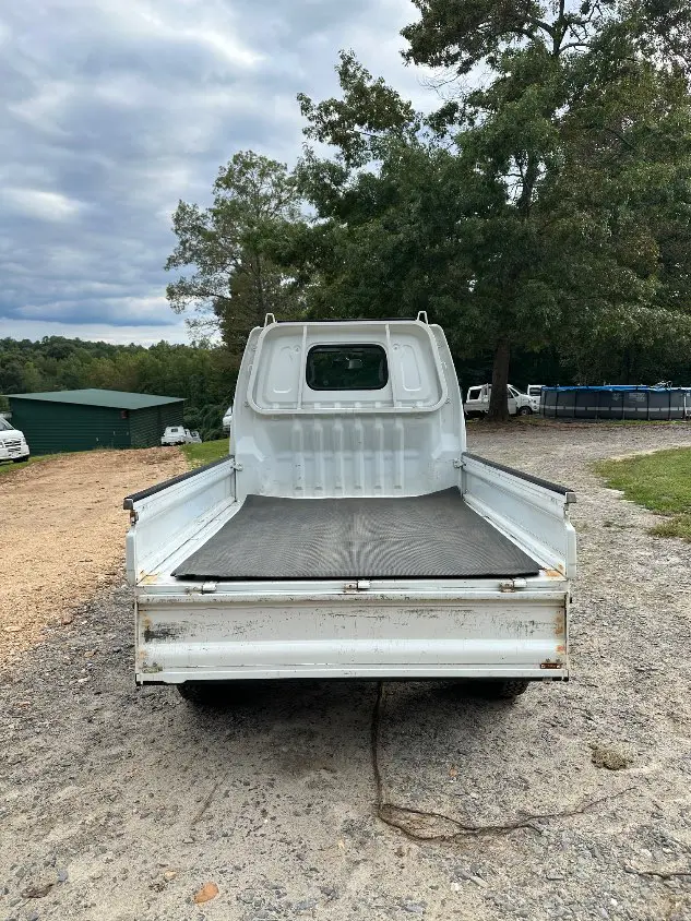 1999 Suzuki Carry 4WD, a white Kei Truck, for sale at Mayberry Mini Trucks in Mount Airy, NC (photo 10 of 20)