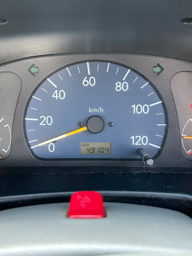 1999 Suzuki Carry 4WD, a white Kei Truck, for sale at Mayberry Mini Trucks in Mount Airy, NC (photo 3 of 20)