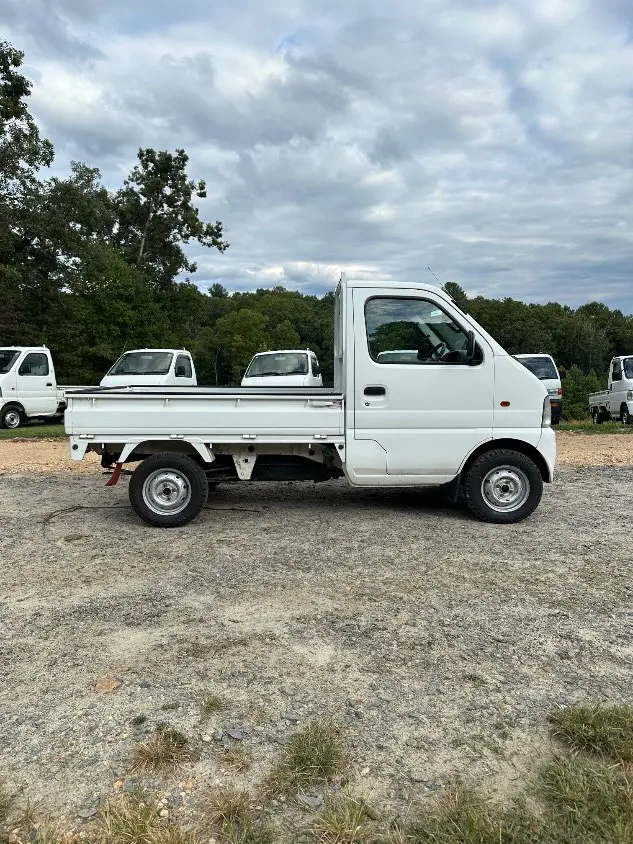 1999 Suzuki Carry 4WD, a white Kei Truck, for sale at Mayberry Mini Trucks in Mount Airy, NC (photo 7 of 20)