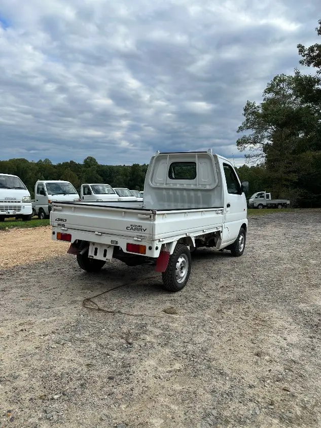 1999 Suzuki Carry 4WD, a white Kei Truck, for sale at Mayberry Mini Trucks in Mount Airy, NC (photo 8 of 20)