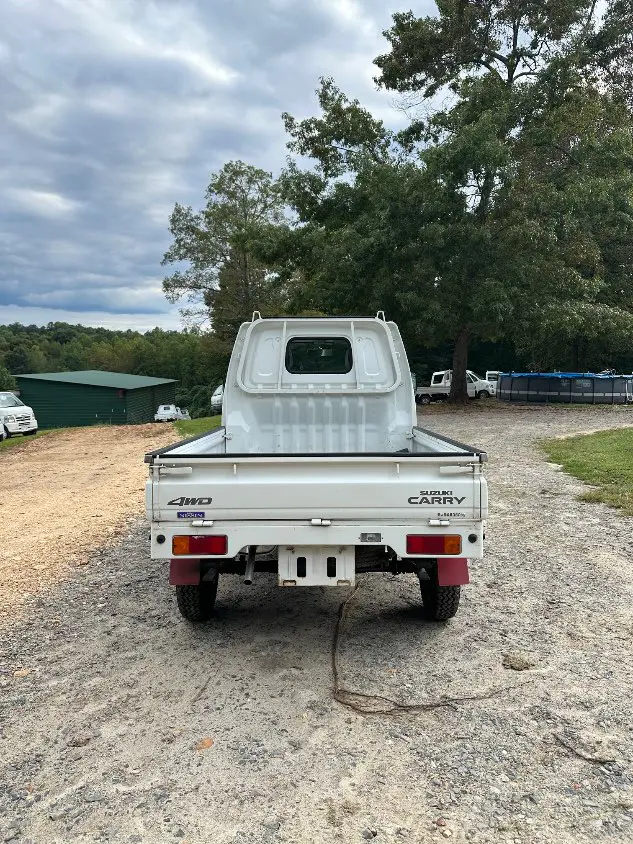 1999 Suzuki Carry 4WD, a white Kei Truck, for sale at Mayberry Mini Trucks in Mount Airy, NC (photo 9 of 20)