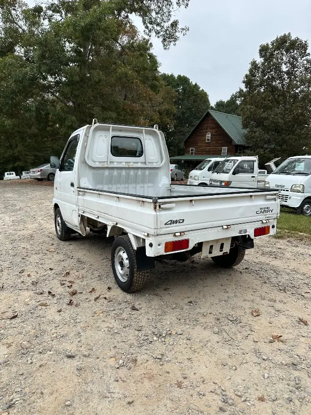 1999 Suzuki Carry 4WD, a white Kei Truck, for sale at Mayberry Mini Trucks in Mount Airy, NC (photo 12 of 20)