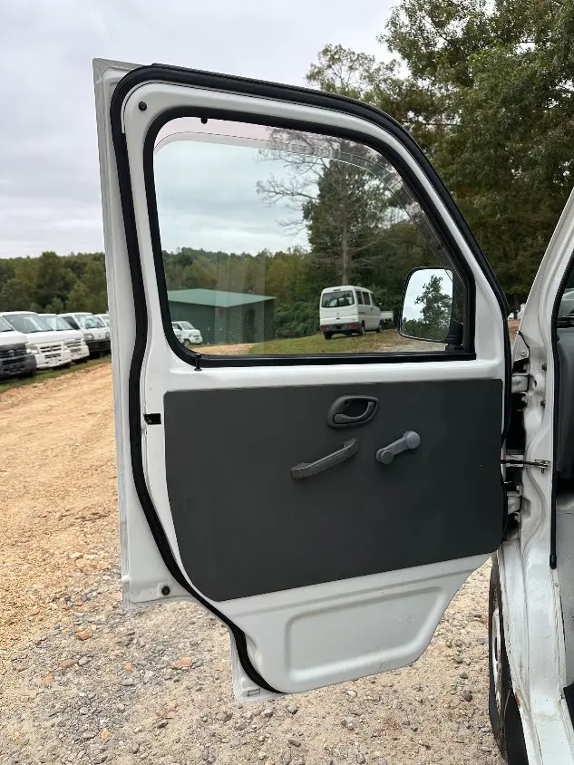 1999 Suzuki Carry 4WD, a white Kei Truck, for sale at Mayberry Mini Trucks in Mount Airy, NC (photo 14 of 20)