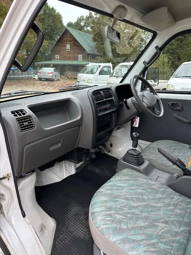 1999 Suzuki Carry 4WD, a white Kei Truck, for sale at Mayberry Mini Trucks in Mount Airy, NC (photo 15 of 20)