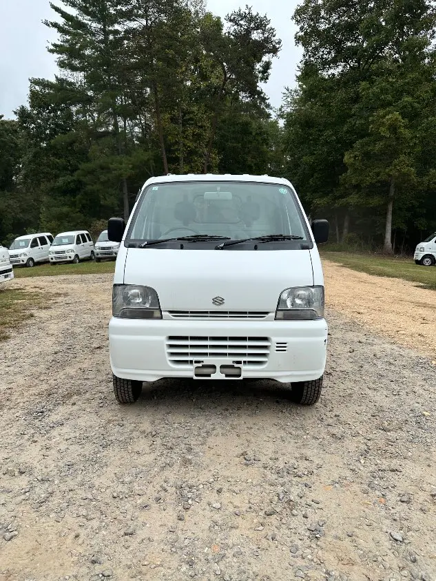 1999 Suzuki Carry 4WD, a white Kei Truck, for sale at Mayberry Mini Trucks in Mount Airy, NC (photo 4 of 20)