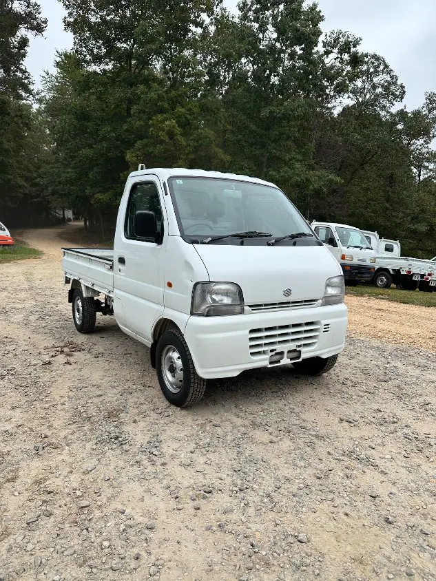 1999 Suzuki Carry 4WD, a white Kei Truck, for sale at Mayberry Mini Trucks in Mount Airy, NC (photo 5 of 20)