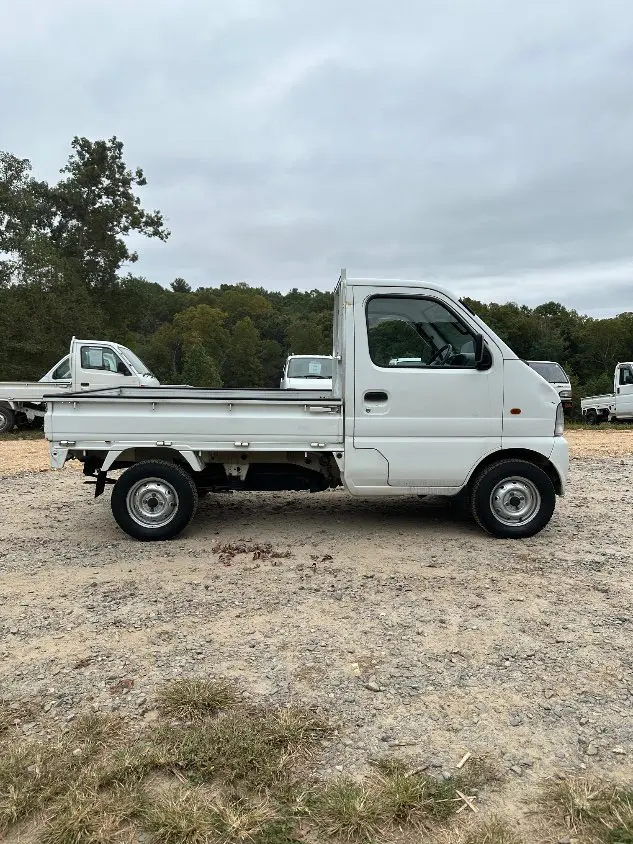 1999 Suzuki Carry 4WD, a white Kei Truck, for sale at Mayberry Mini Trucks in Mount Airy, NC (photo 6 of 20)
