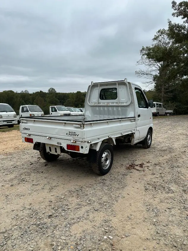 1999 Suzuki Carry 4WD, a white Kei Truck, for sale at Mayberry Mini Trucks in Mount Airy, NC (photo 7 of 20)
