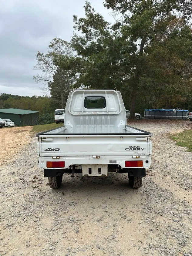 1999 Suzuki Carry 4WD, a white Kei Truck, for sale at Mayberry Mini Trucks in Mount Airy, NC (photo 8 of 20)