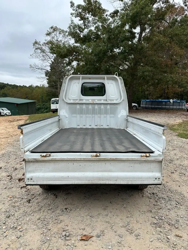 1999 Suzuki Carry 4WD, a white Kei Truck, for sale at Mayberry Mini Trucks in Mount Airy, NC (photo 9 of 20)