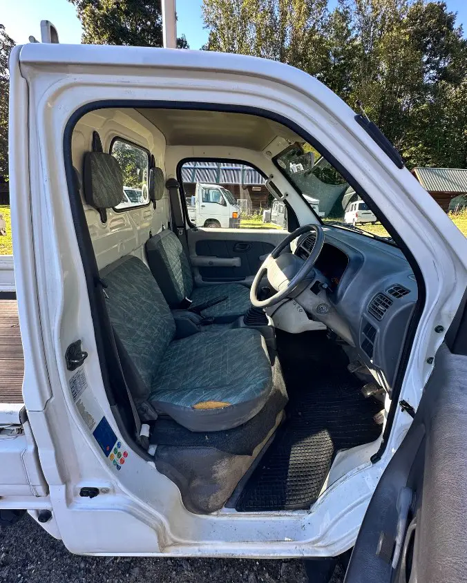 1999 Suzuki Carry 4WD, a white Kei Truck, for sale at Mayberry Mini Trucks in Mount Airy, NC (photo 11 of 17)