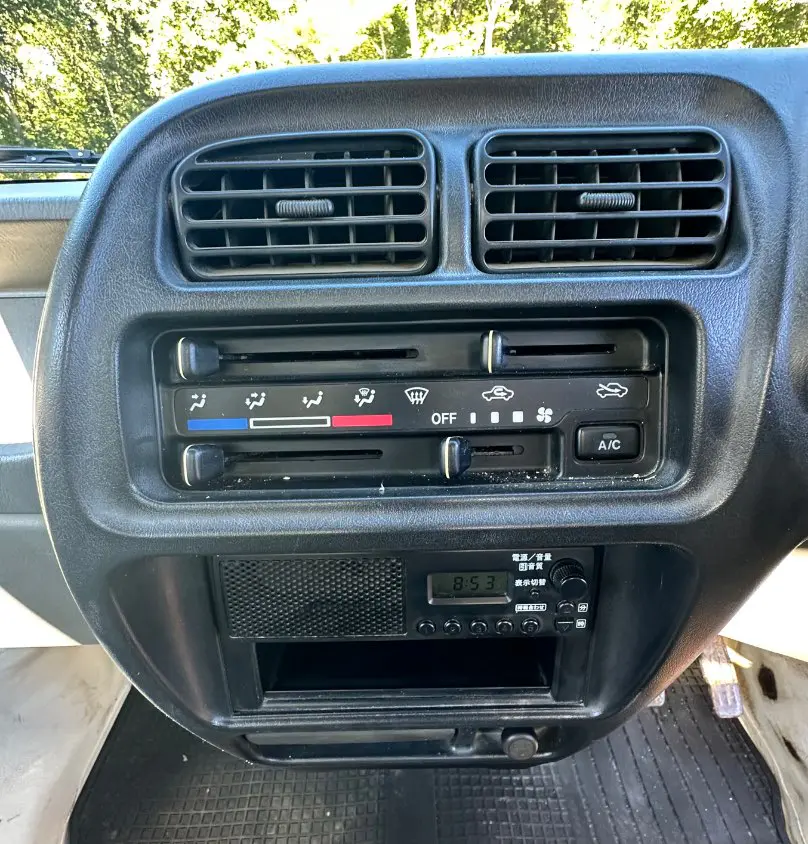 1999 Suzuki Carry 4WD, a white Kei Truck, for sale at Mayberry Mini Trucks in Mount Airy, NC (photo 14 of 17)