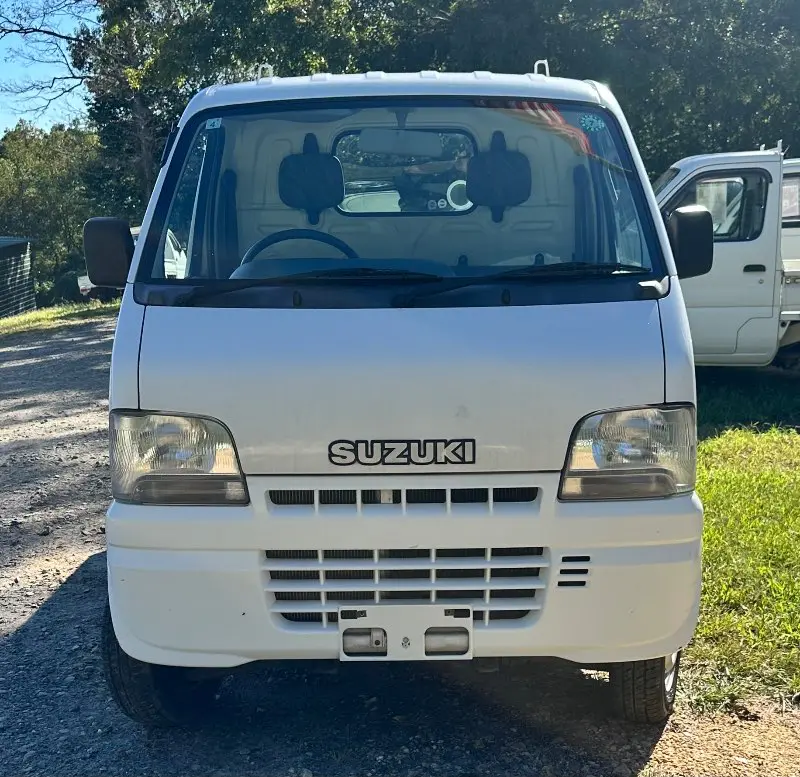 1999 Suzuki Carry 4WD, a white Kei Truck, for sale at Mayberry Mini Trucks in Mount Airy, NC (photo 2 of 17)