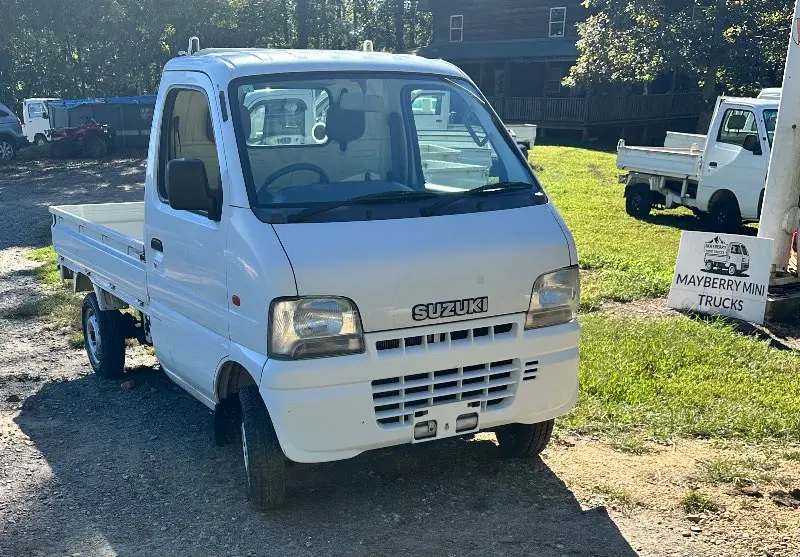 1999 Suzuki Carry 4WD, a white Kei Truck, for sale at Mayberry Mini Trucks in Mount Airy, NC (photo 3 of 17)