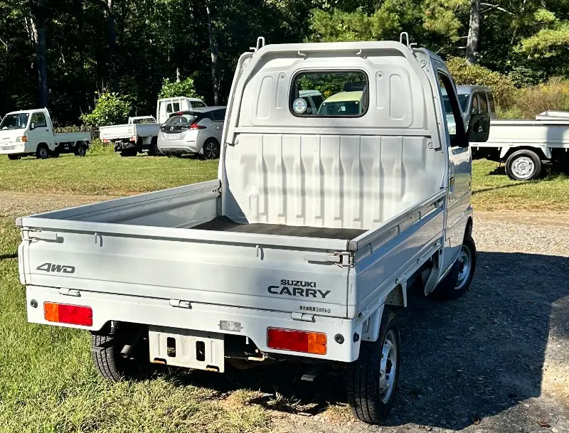 1999 Suzuki Carry 4WD, a white Kei Truck, for sale at Mayberry Mini Trucks in Mount Airy, NC (photo 5 of 17)